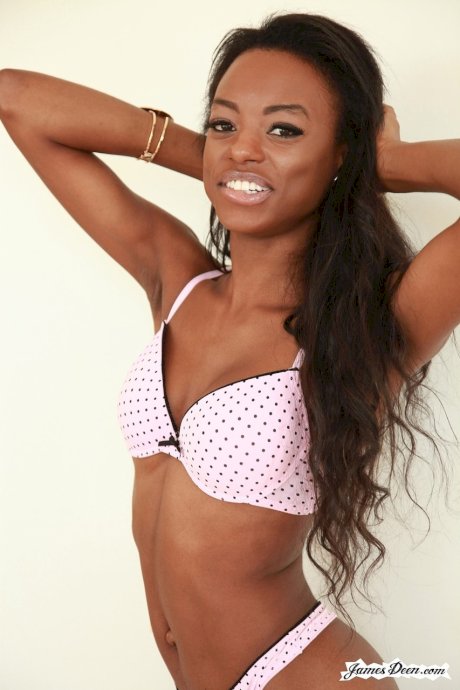 Young ebony Tiffany Taylor squeezes her hot boobs and rubs black coochie