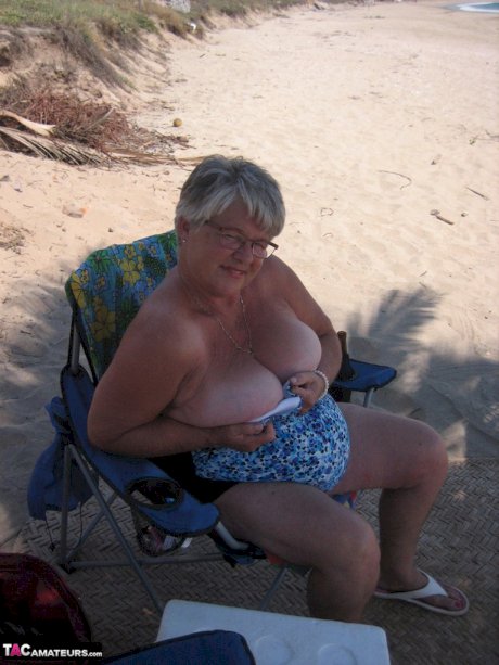 Fat granny Girdle Goddess takes off swimwear to pose nude at the ebach