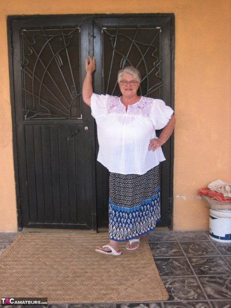 Old amateur Girdle Goddess exposes her obese body outside her front door