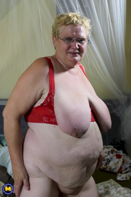Blonde granny Edeltrud reveals her huge naturals and toys her swollen vagina