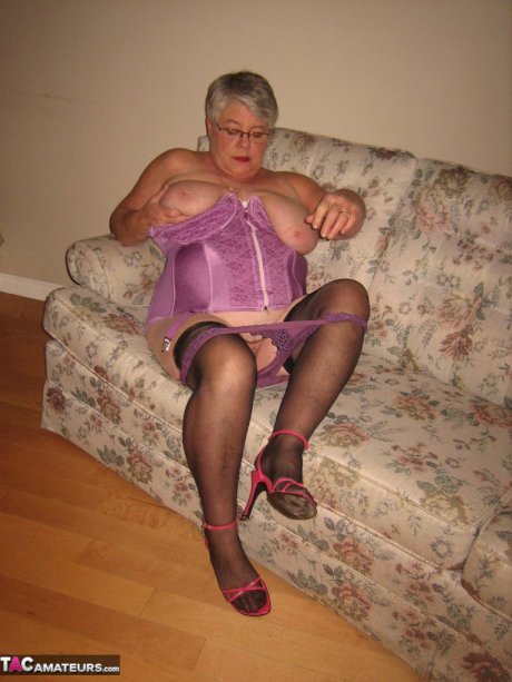 Fat granny Girdle Goddess lets her large boobs loose from lingerie