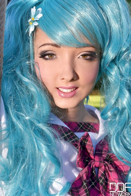 Cosplaying hottie Lucie Wilde shows off her massive hooters outside