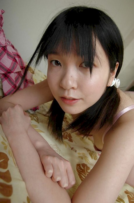 Shy asian teen stripping down and showcasing her gash in close up