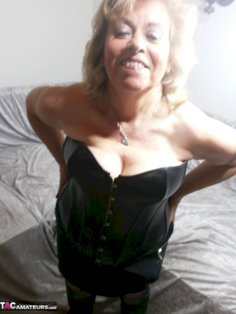 Mature lady next door Caro films herself masturbating home alone
