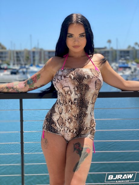 Curvaceous stunner Payton Preslee flaunting her huge melons in a pink bikini