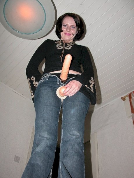 Femdom Helen Sykes strips naked while playing with her BDSM sex toy