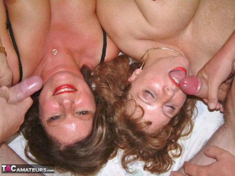 Older British amateur Curvy Claire and a girlfriend partake in a hardcore orgy