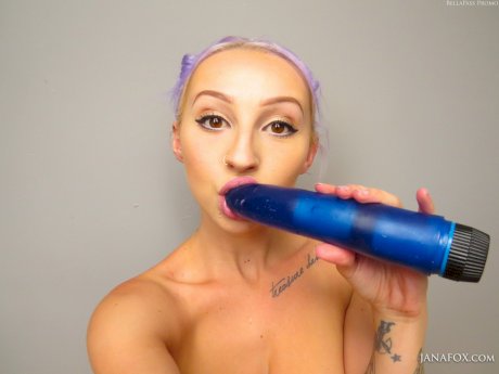 Short haired amateur Jana Fox takes self shots of her big tits and pink pussy
