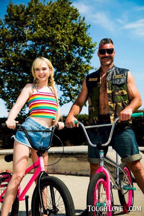 Young blonde Lilly Bell and her older boyfriend bicycle before they fuck