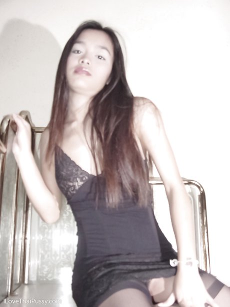 Adorable asian babe posing and showing off her sweet titties and muff