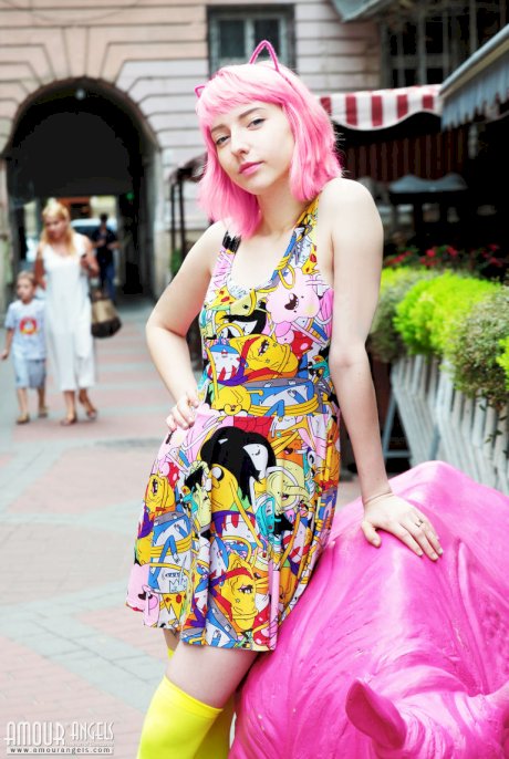 Teen solo girl with pink hair display her bald twat in yellow OTK socks