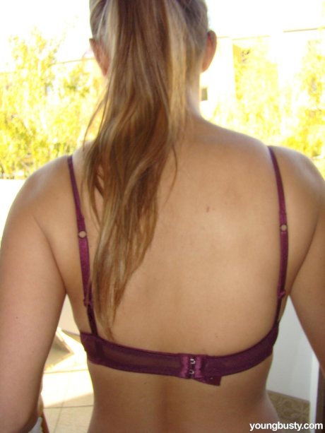 Young busty blonde Kathy displaying her large boobs & her great ass