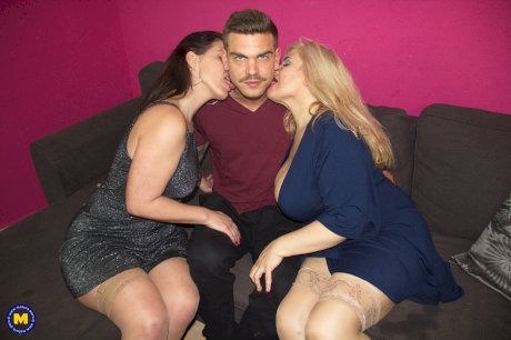 Spanish housewives share a lesbians kiss in front of a younger boy