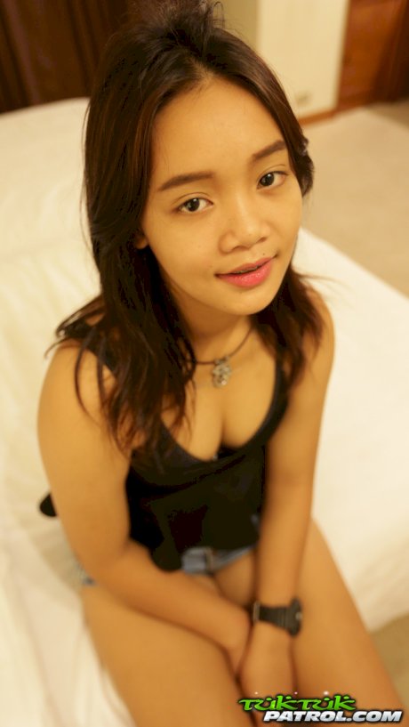 Barely legal Thai girl eats a man's ass before bareback sex in motel room