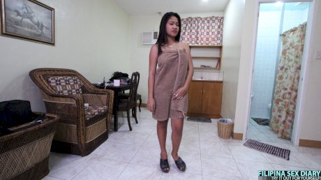 Big titted Asian girl Potchie stands naked before POV sex with a Farang