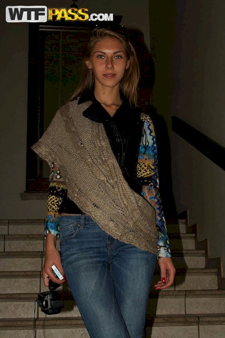 Slim amateur uncovers her small tits in blue jeans during homemade action