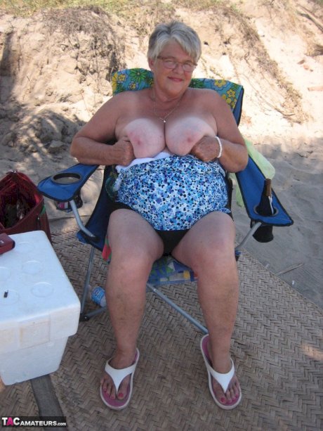 Fat granny Girdle Goddess takes off swimwear to pose nude at the ebach
