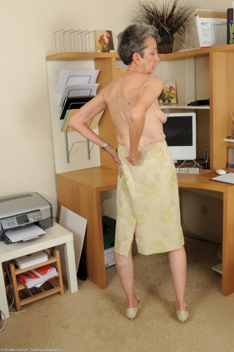 Granny secretary Cassie strips & shows off her fragile body completely nude 