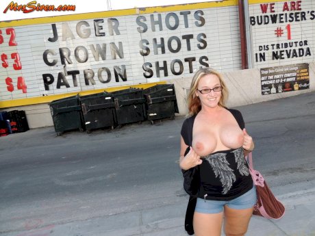 Big boobed mature blonde Dee Siren flashes her tits and goes naked in public