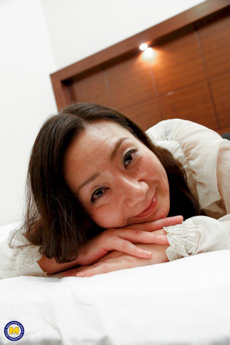 Gorgeous Japanese MILF Sara Yumeka strips and poses in her lingerie