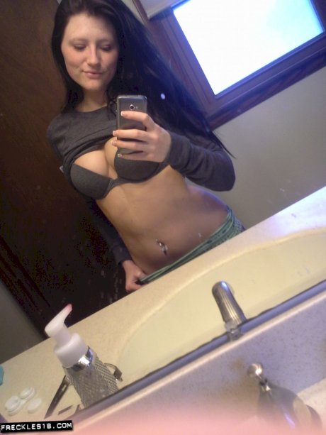 Stacked brunette cutie Freckles 18 takes pictures of her naked body