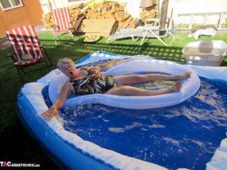 Fatty mature granny Girdle Goddess peels to enjoy wading pool skinny dip