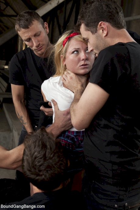 American schoolgirl Casey Cumz getting spit roasted in a wild BDSM gangbang