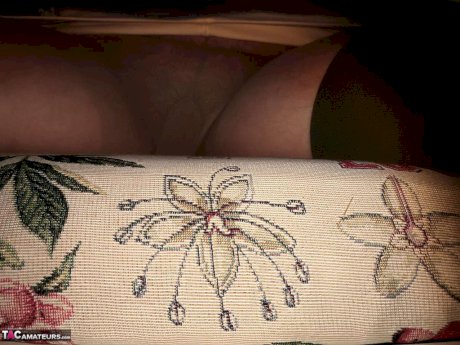 Big titted oma Caro pulls down her underwear to show her big ass in nylons