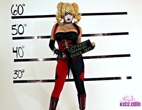 Busty cosplay cutie strips her costume to show her cartoonish proportions