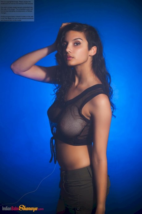 Indian female models non nude in a see thru top and shorts