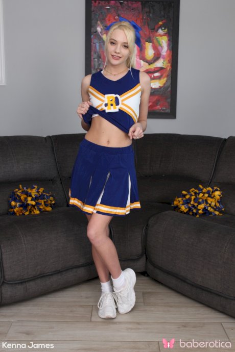 Skinny cheerleader Kenna James strips naked and masturbates with a dildo
