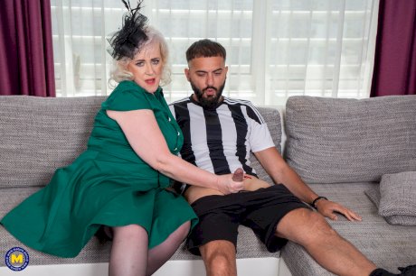 Platinum blonde granny Pure Vicky has sex with a younger man in stockings