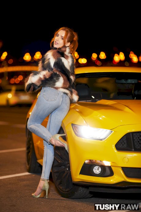 Redheaded pornstar Scarlett Jones gets her round ass banged by Alberto Blanco