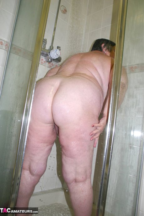 Obese granny Grandma Libby fondles her naked body while taking a shower