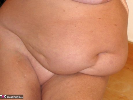 Fat British nan Grandma Libby completely disrobes while in a hotel room