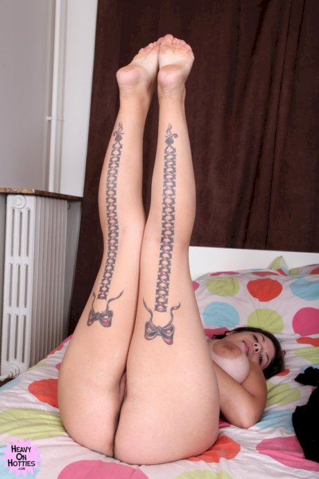 Tattooed amateur Kimy Blue sets her curvy body free of a dress and lingerie