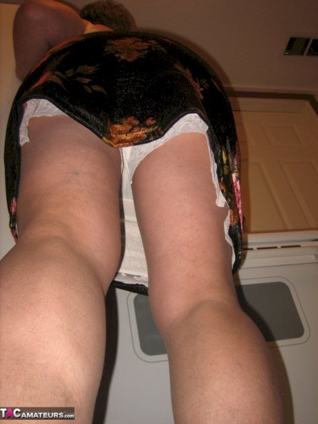 Old woman Girdle Goddess strips to pantyhose in her kitchen