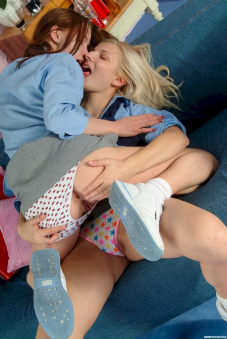 Lesbian girls removes matching outfits before pleasuring pussies