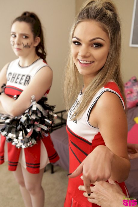 Slutty blonde cheerleader interrupts practice to fuck stepbrother for creampie