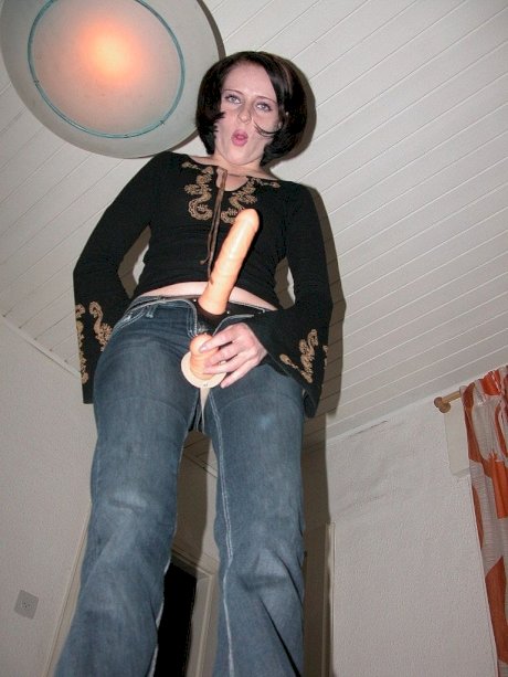 Femdom Helen Sykes strips naked while playing with her BDSM sex toy