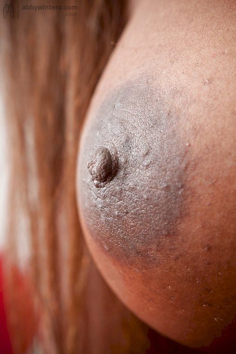 Busty amateur ebony Anouk flashing her big natural black tits outdoors