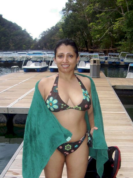Plump Indian chick shows her big naturals in and out of clothes