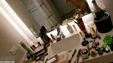 Amateur model takes naked and non naked bathroom selfies in mirror