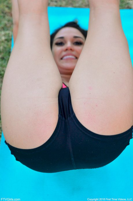 Petite cutie Jynx strips nude and flaunts her titties & shaved vagina outdoors