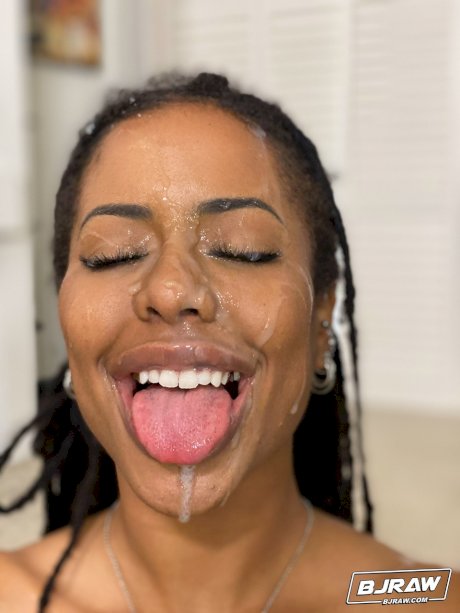Curvy ebony Kira Noir exposes her firm fake tits before a blowjob & big facial