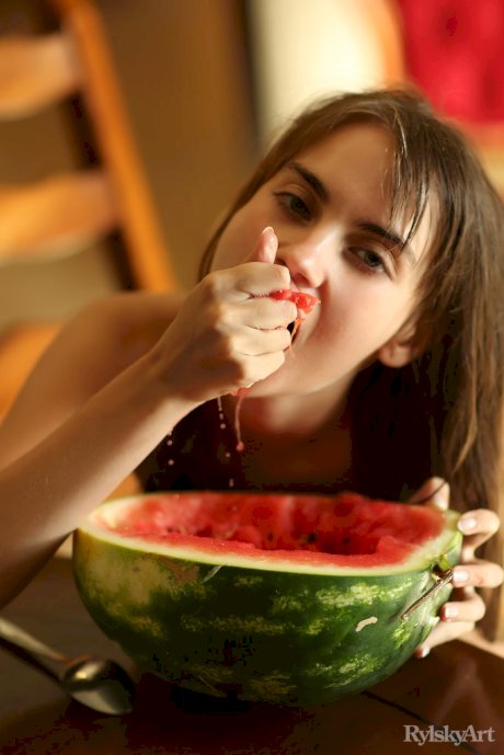 Adorable teen Sofy Bee gets messy while eating watermelon in the nude