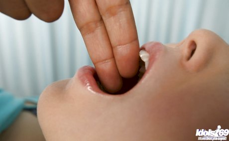 Busty asian babe Rika Kijma gets stripped and gets her pussy examed