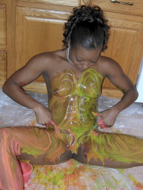 Ebony amateur Anastasia covers her hot body with paint in the kitchen