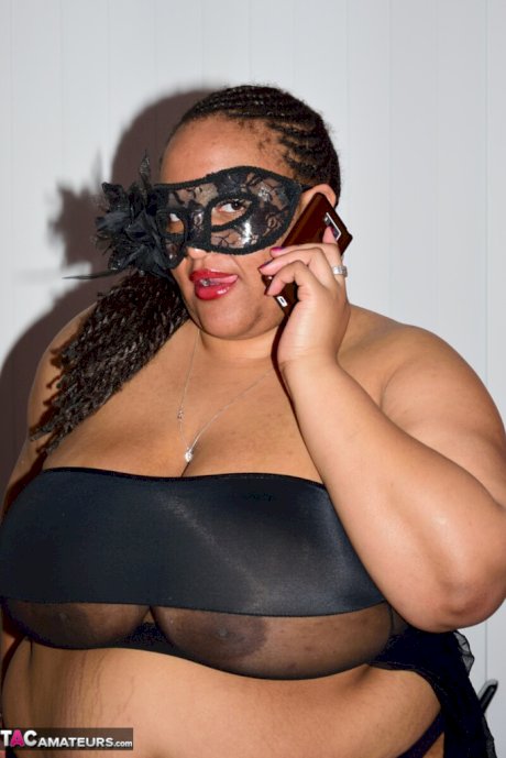 SSBBW wears a mask while unveiling her huge saggy tits and massive ass
