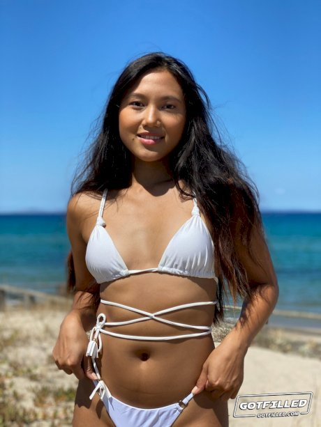 Young girl May Thai sports a creampie after a day at the beach and POV sex too